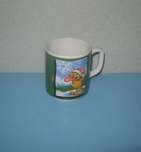 Garfield the Cat Licking Snow w/ Tongue Hanging Out Christmas Coffee Mug - Picture 1 of 2