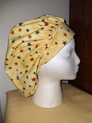 Blue & Red Stars on Yellow Medical Surgical Bouffant Scrub Hat Medium - Image 1 of 2