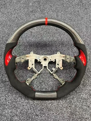 Volante de cuero de fibra de carbono apto para Toyota Tundra Land Cruiser Sequoia HiAce Foto 1 de 4