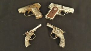 4 Toy Cap Guns  1940's Hubley Lot of 4 - Rare - Vintage Cast Iron . All Working.