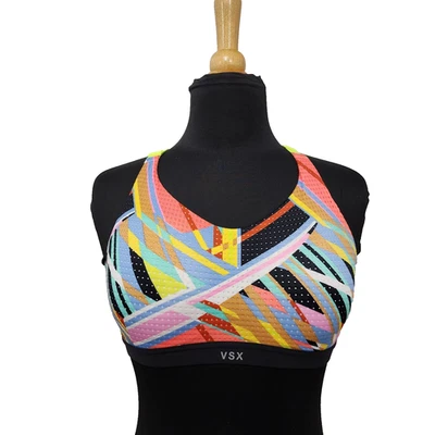 Sujetador deportivo Victoria's Secret VSX deportivo acolchado multicolor graffiti espalda cruzada 34C Foto 1 de 4