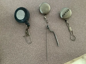 Orvis Zinger Retraktoren plus zwei weitere, 2 Metall, ein Kunststoff, alle funktionieren einwandfrei - Bild 1 von 1