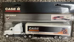 ERTL 1:64 Kenworth T600B Semi Case IH Construction Corporation w/ Skid Steer NEW - Picture 1 of 3