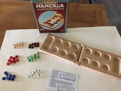 Mancala de madera - El juego de coleccionar piedras preciosas clásicos familiares Pressman Foto 1 de 4