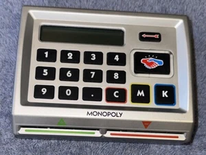 2008 Monopoly Here & Now World Brettspiel elektronischer Banker nur Teil  - Bild 1 von 4