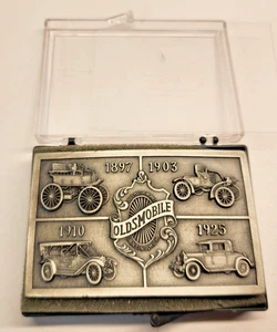 Vintage 1970s Oldsmobile Belt Buckle. Featuring 4 Early Cars. Pewter - Picture 1 of 3