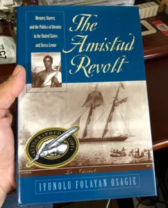 'The Amistad Revolt' Iyunolu Folayan Osagie HC 1st Signed 2000 - Picture 1 of 10