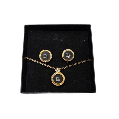 Conjunto de pendientes collar logotipo Dior tono dorado esmalte negro estrás Foto 1 de 4