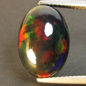 5.01Ct Natural Color Play Ethiopian Black Opal Oval Shape Cabochon Loose Gem VOD - Picture 1 of 5