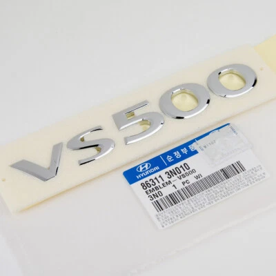 PLACA EMBLEMA VS500 HYUNDAI EQUUS PUERTA LEVADIZA GENUINA MALETERO 10-16 86311-3N010 Foto 1 de 4