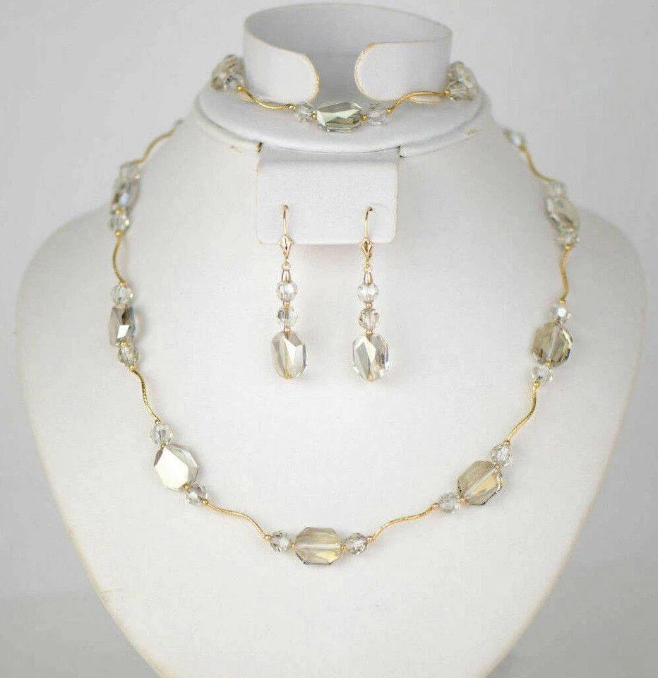 Juego de joyas de cristal de tono plata oro amarillo de 14k: collar, pulsera, pendientes Foto 1 de 1