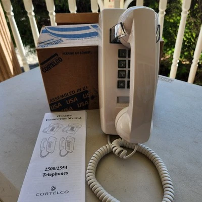 NEW CORTELCO 255415-VBA-20M WHITE WALL PHONE, HEARING AID COMPATIBLE - Image 1 of 4