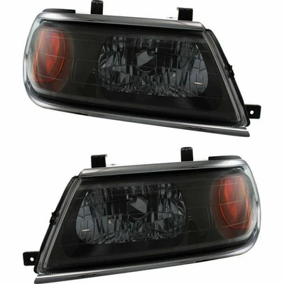 Par de faros para MITSUBISHI MONTERO SPORT 2000 Foto 1 de 4