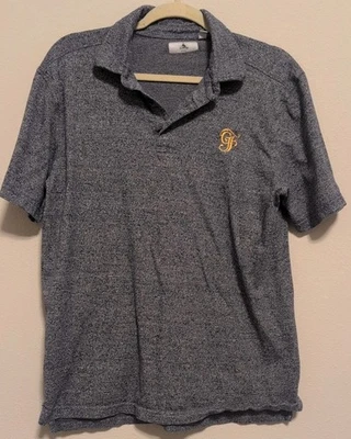 Camisa polo Grand Floridian azul mediana para hombre Foto 1 de 4