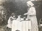 Edwardian Portrait  Prayers At Tea Time  Two Girls In Garden