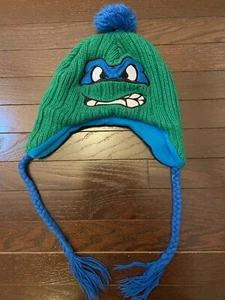 cappello maglia invernale tartaruga ninja maschera verde blu ragazzo trecce pom pom - Foto 1 di 2