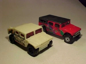 LOTE 2: Leopard Humvee-AM Hot Wheels y Realtoy 1/64 Diecast ambos muy buenos sueltos - Imagen 1 de 7