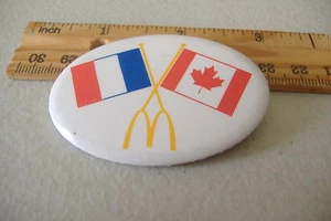 ~MCDONALDS~FRANCE & CANADA FLAGS~OVAL BUTTON PIN~ - Picture 1 of 2