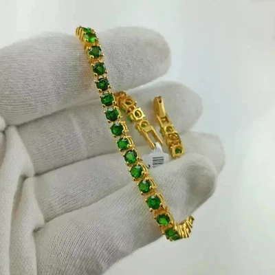Lab Created 12ct Green Emerald Women'sTennis Bracelet 14K Yell Gold Plated 7.5" - Image 1 of 4
