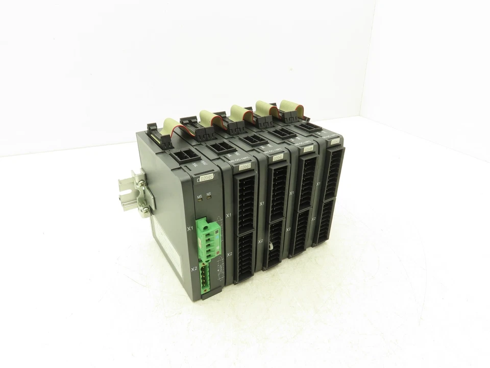 Okuma DN-OC-16PC2 PLC Output Card Module 2A & Power Supply DN-SLV Lot of 5 - Image 1 of 4