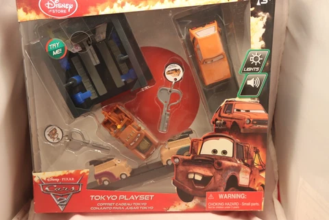 NEW Disney Store CARS 2 Cars Key Charger Tokyo Play Set Lights Launcher NIB Cover