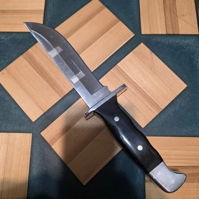 Cuchillo de hoja fija Buck 124 Frontiersman EE. UU. 2013 mango negro Micarta (501) Foto 1 de 4