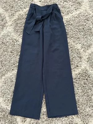 Pantalones de mujer Lululemon negro de pierna ancha con cinturón azul marino talla 2 Foto 1 de 4