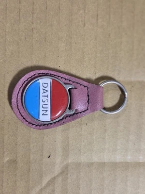 Nuevo de Lote Antiguo Llavero Malva Datsun Foto 1 de 2