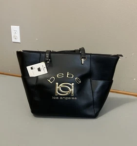 Schöne BEBE LA LOS ANGELES 2-teilige Beuteltasche und Beuteltasche, schwarz/gold (neu mit Etikett) - Bild 1 von 7
