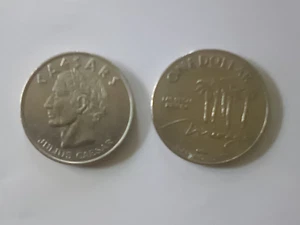 (2) Vintage One Dollar Spielmarken Caesar's Atlantic City & Mirage Las Vegas - Bild 1 von 2