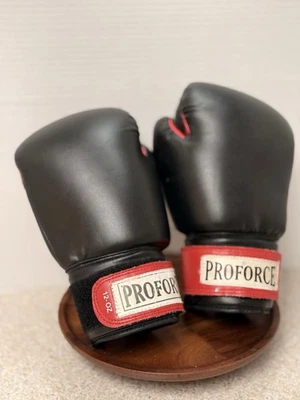 PROFORCE 12 OZ  Pair Of Leatherette Boxing Gloves Black W/Red - Image 1 of 4