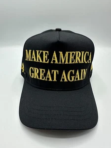 OFICIAL Cali-Fame Trump Make America Great Again Sombrero Negro y Dorado 45-47 - Imagen 1 de 8