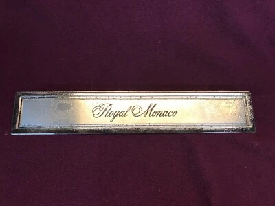 1974-1977 DODGE ROYAL MONACO REAR TRIM PANEL EMBLEM MOPAR 3811033 96315 - Image 1 of 4