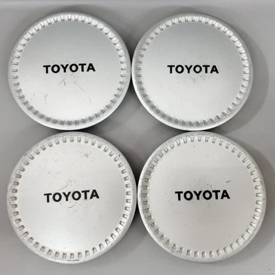 Juego de tapacubos centrales de rueda plateados para Toyota Corolla 86-88 de fábrica Foto 1 de 4