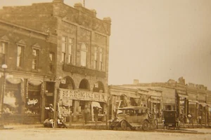 Antique 1915 Real Photo Postcard Hartley IA Great Signage Main Street Dirt Road - Picture 1 of 7