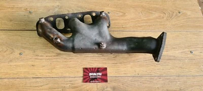 COLECTOR DE ESCAPE NISSAN 350Z Z33 VQ35DE FABRICANTE DE EQUIPOS ORIGINALES FUNDIDO PASAJERO CERCANO Foto 1 de 2