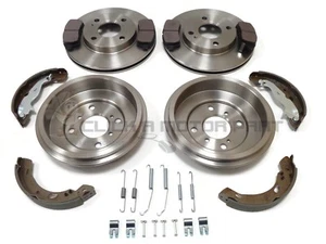 FORD FIESTA MK7 FRONT 2 BRAKE DISCS AND PADS REAR 2 DRUMS & SHOES & FITTING KIT - Picture 1 of 1