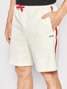 Nuevo Hugo Boss Hombre Crema Marfil Atletismo Verano Vacaciones Gimnasio Pantalones Cortos Medianos - Imagen 1 de 12