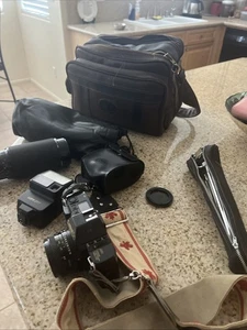 Canon T70 analoge Spiegelreflexkamera 35 mm komplett mit Objektivtasche Made in Japan - Bild 1 von 14