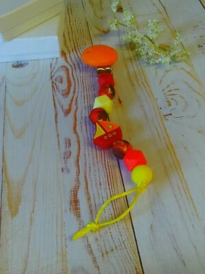 Cordones de chupete de aprendizaje sensorial de personajes de silicona con cadena de cuentas y clip Foto 1 de 4