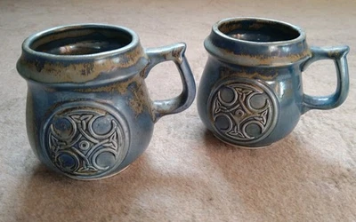 Pre-owned Pair Of Port Madoc Blue Glaze Mugs With Celtic Cross Motif - GC - Image 1 of 4