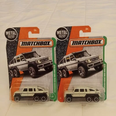 Лот из 2 2016 спичечный коробок Mercedes-Benz G63 AMG 6x6 белый 1/64 литые автомобили как новый на картонке - Изображение 1 из 4