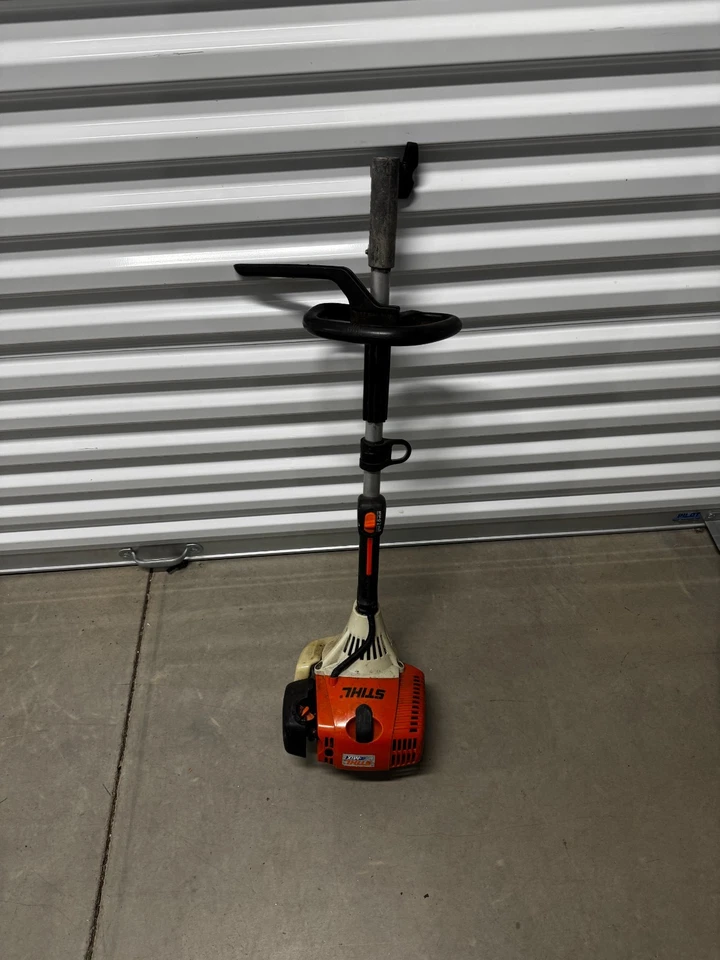 Cabezal eléctrico y acelerador del motor STIHL KM90R Weedeater/Trimmer 28cc Foto 1 de 4