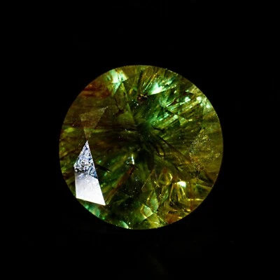 DEMANTOID GARNET  URAL TAGIL 1.45CT, 6.6mm  good dispersion Horsetail inclusion - Image 1 of 4