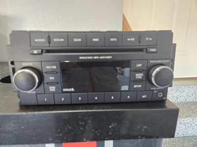 Dodge RAM 1500 2009-2012 OEM CD AM FM MP3 Aux Radio Stereo P05091164AB - Image 1 of 2