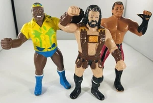 3 VINTAGE LJN WWF FIGURES HERCULES / BRUTUS BEEFCAKE / SPECIAL DELIVERY JONES - Picture 1 of 7