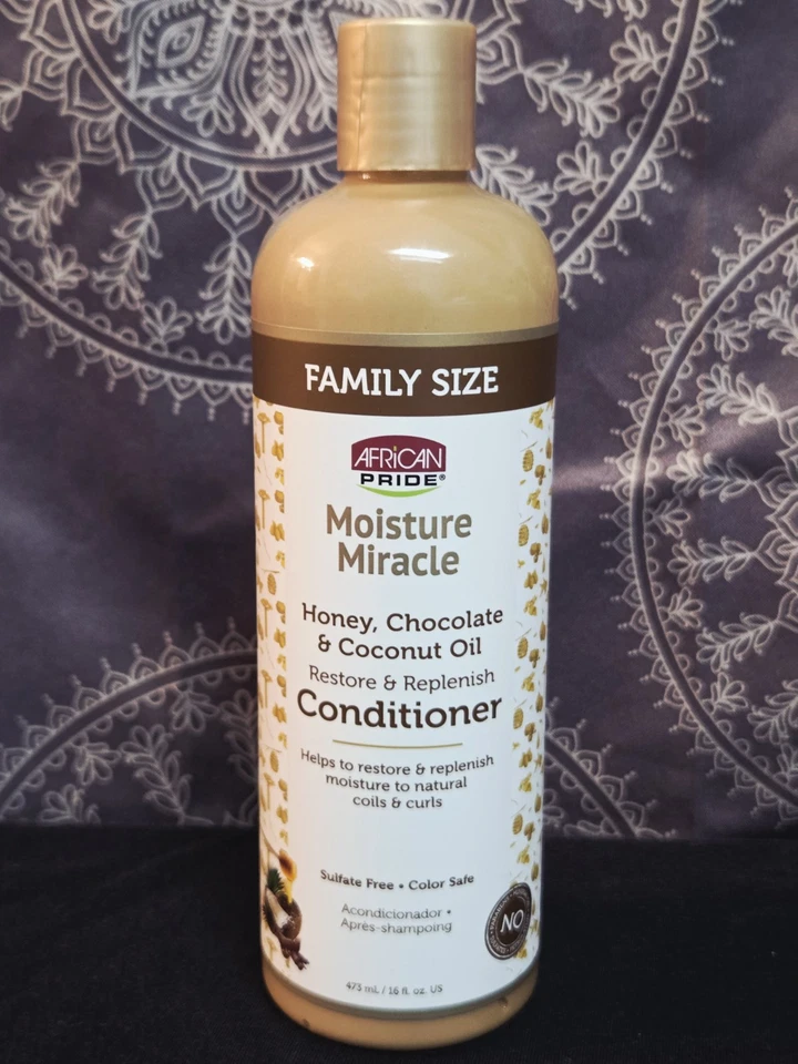 Acondicionador African Pride Moisture Miracle Miel Chocolate y Coco 16 FL oz Foto 1 de 3