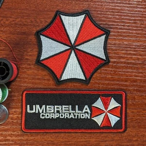 Umbrella Corporation Logo & Badge 2 Patch Set Resident Evil Biohazard Iron On - Picture 1 of 4