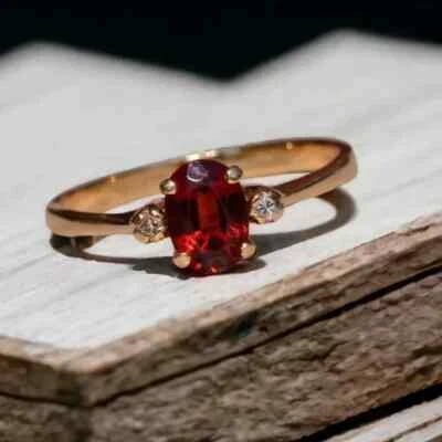 Simulated 0.76CT Red Ruby & White Moissanite 10K Yellow Gold Three Stone Ring - Image 1 of 4