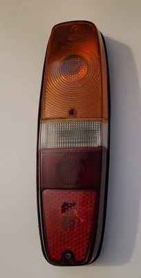 145/245 VOLVO HELLA Rear RIGHT Tail Light Assembly  RED Plastic Cracked Used - Image 1 of 4
